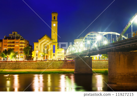 Night view of Bridge over Ebro river and church in Tortosa Night view of Bridge over Ebro river and church in Tortosa 11927215