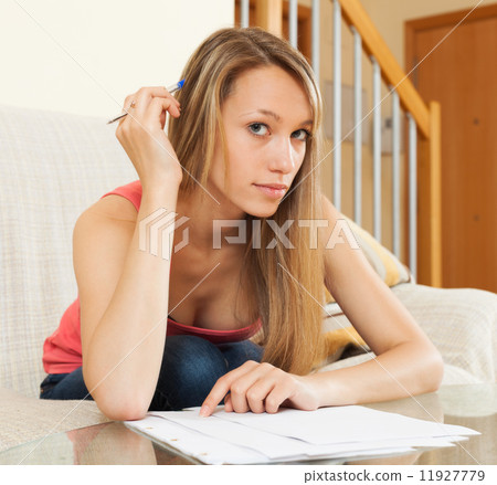 Woman working with papers Woman working with papers 11927779