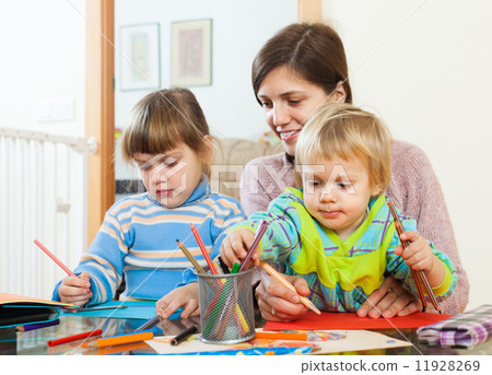 Mother and two children together with pencils Mother and two children together with pencils 11928269