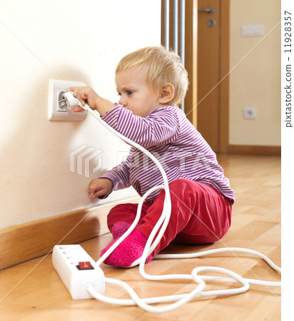 toddler playing with electricity at home toddler playing with electricity at home 11928357