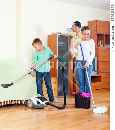 Ordinary family doing cleaning Ordinary family doing cleaning 11928358