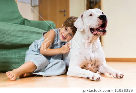 Nice girl toddler on the floor with dog 11928359