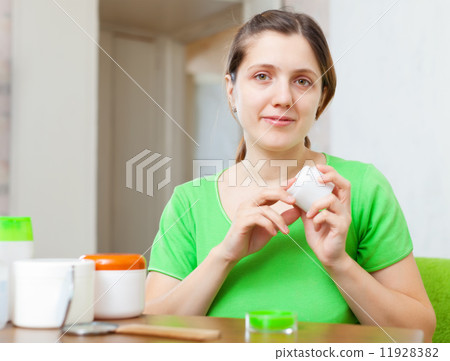 woman in green caring for her body 11928382