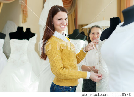 happy women chooses bridal outfit happy women chooses bridal outfit 11928588