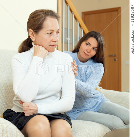 Teenager tries reconcile with her mother after conflict Teenager tries reconcile with her mother after conflict 11928597