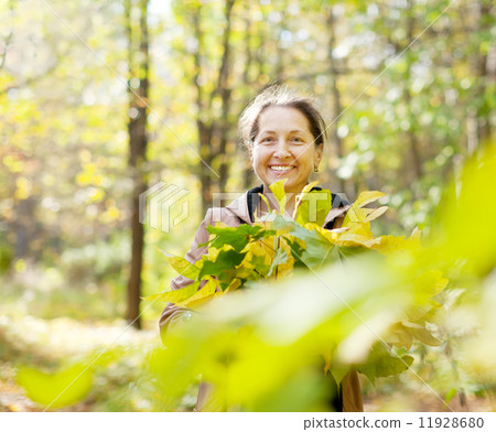 mature woman in autumn 11928680