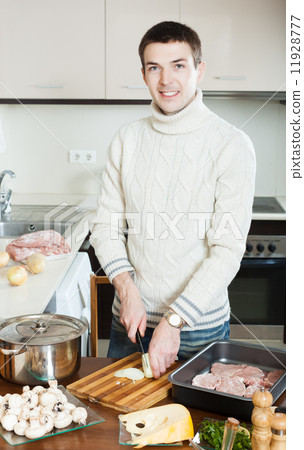 man Cooking french-style veal man Cooking french-style veal 11928777