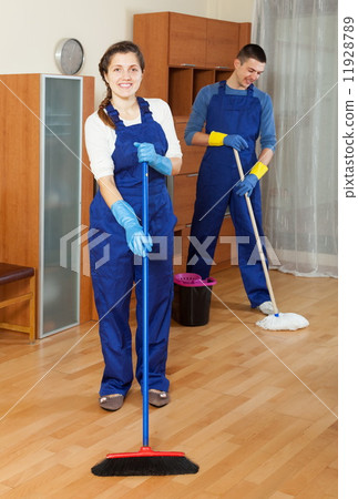 Two ordinary cleaners cleaning floor 11928789