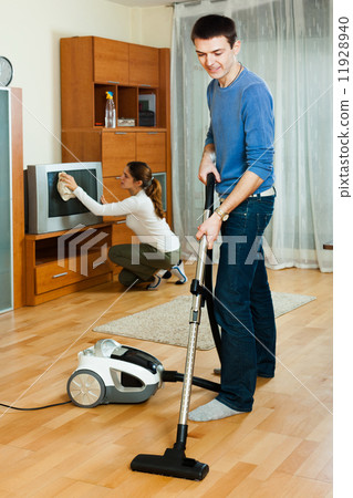 Ordinary family doing housework together Ordinary family doing housework together 11928940