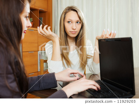 Blonde girl talking with employee with notebook Blonde girl talking with employee with notebook 11929203