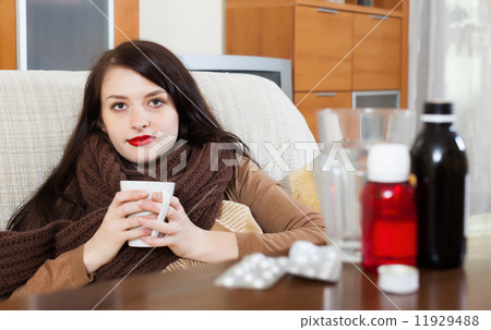 Sick girl with medications 11929488