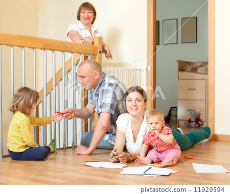 Portrait of happy multigeneration family with little children co 11929594