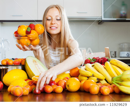 blonde long-haired woman choosing fruits blonde long-haired woman choosing fruits 11929629