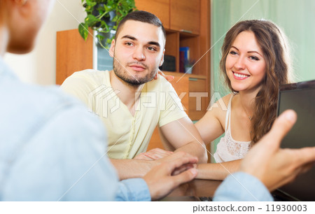 Happy couple answer questions 11930003