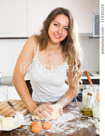 Housewife cooking at home kitchen Housewife cooking at home kitchen 11930229