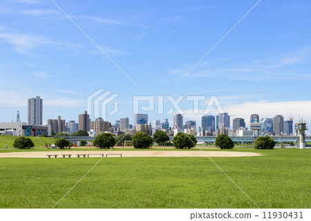 Osaka city area landscape from Yodogawa River Park 11930431