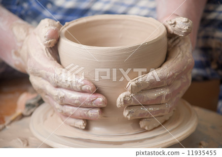 Hands of a potter Hands of a potter 11935455