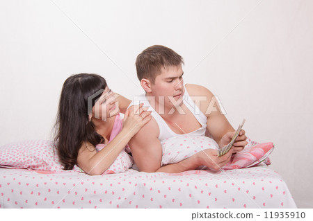Husband thinks money. Wife fawns Husband thinks money. Wife fawns 11935910