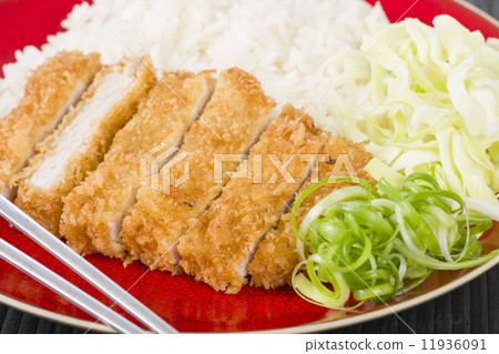 Tonkatsu - Japanese breaded, deep-fried pork cutlet with boiled rice. 11936091