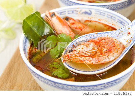 Tom Yum Goong - Thai hot and sour soup with prawns & mushrooms  11936182
