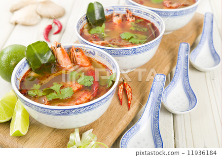 Tom Yum Goong - Thai hot and sour soup with prawns & mushrooms  11936184
