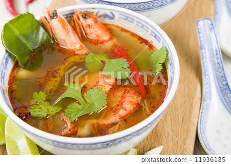 Tom Yum Goong - Thai hot and sour soup with prawns & mushrooms  11936185