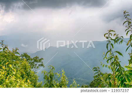 ridges of theSmokey Mountains extending across the valley on the 11937237