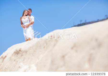 Couple on a Tropical Beach Couple on a Tropical Beach 11939378