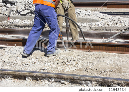 Two Workers with pneumatic hammer 11942584