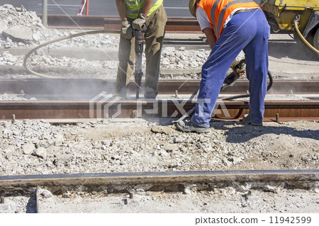 Two Workers with pneumatic hammer 11942599