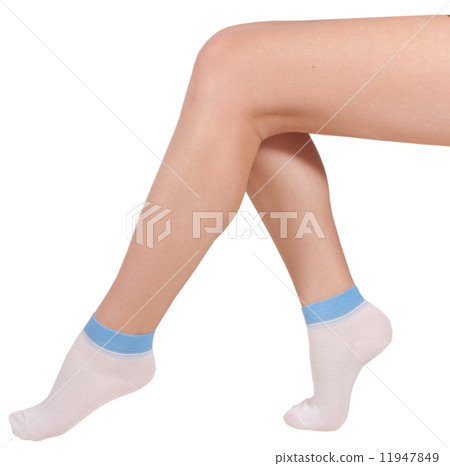 Female legs in socks. Isolated on white background 11947849