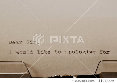 Text Dear Sir typed on old typewriter 11948826