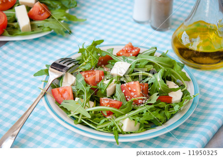 Greece salad with mozzarella, ruccola and tomatoes 11950325