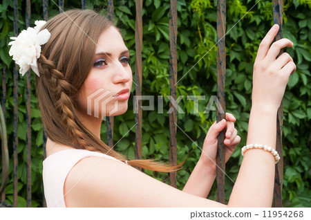 Attractive woman with flower hairstyle Attractive woman with flower hairstyle 11954268