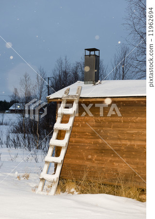 ladder on wooden hut lapland in winter ladder on wooden hut lapland in winter 11962694