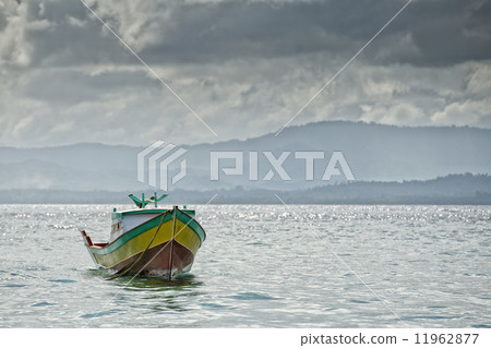 A boat near indonesian fishermen village A boat near indonesian fishermen village 11962877