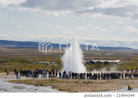 Geyser blow in Iceland while blowing water 11964344