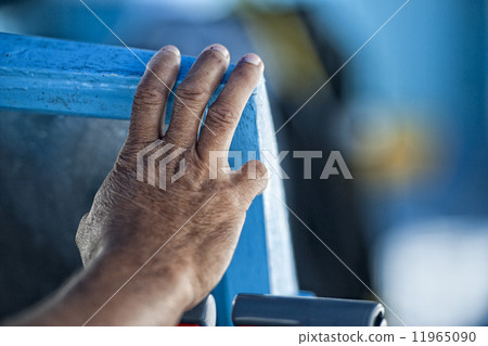 Hand of old man on a fishing boat Hand of old man on a fishing boat 11965090