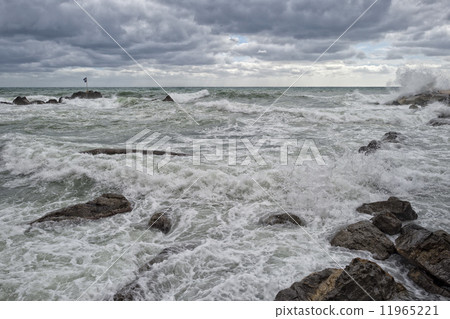 Sea Storm tempest on the rocks 11965221