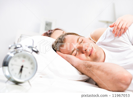 man sleeping in bed man sleeping in bed 11967053