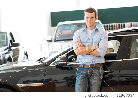 man standing near a car man standing near a car 11967054