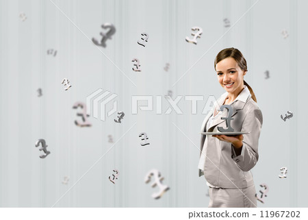 business woman holding a tablet with british pound business woman holding a tablet with british pound 11967202
