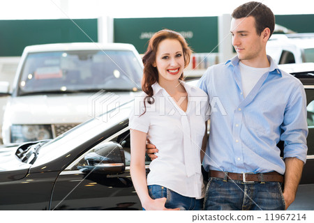 Young couple in the showroom Young couple in the showroom 11967214