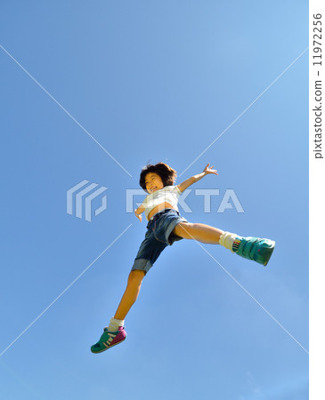 Girls to jump in the blue sky 11972256