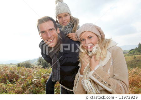 Family having fun in countryside Family having fun in countryside 11972929