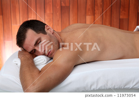 Man in massage room 11973054