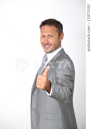 Businessman in grey suit Businessman in grey suit 11973202