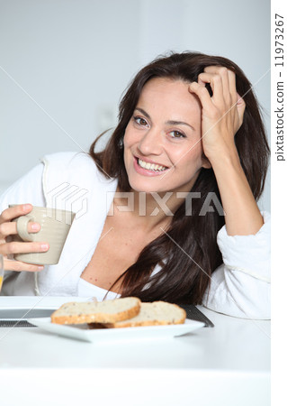 Closeup of woman having breakfast 11973267