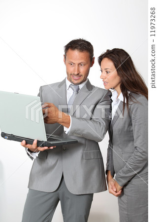 Workteam with laptop computer 11973268