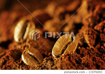 Macro coffee beans and ground coffee 11976891
